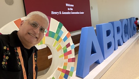 ABRCMS 2025- Roca selfie in front of conference poster